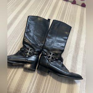 Black Tory Burch riding boots with silver buckle. Worn